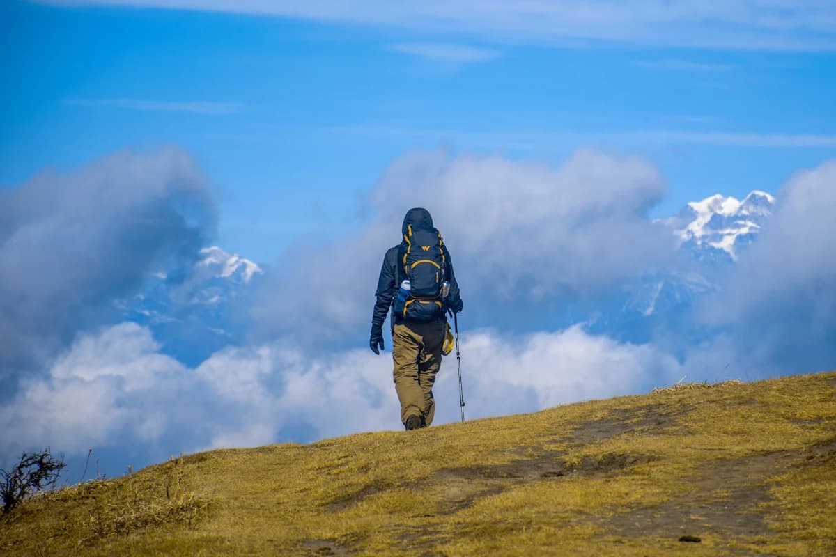 Picture to Video AI animate photo AI driving the sky in a summit frame as the climber freezes
