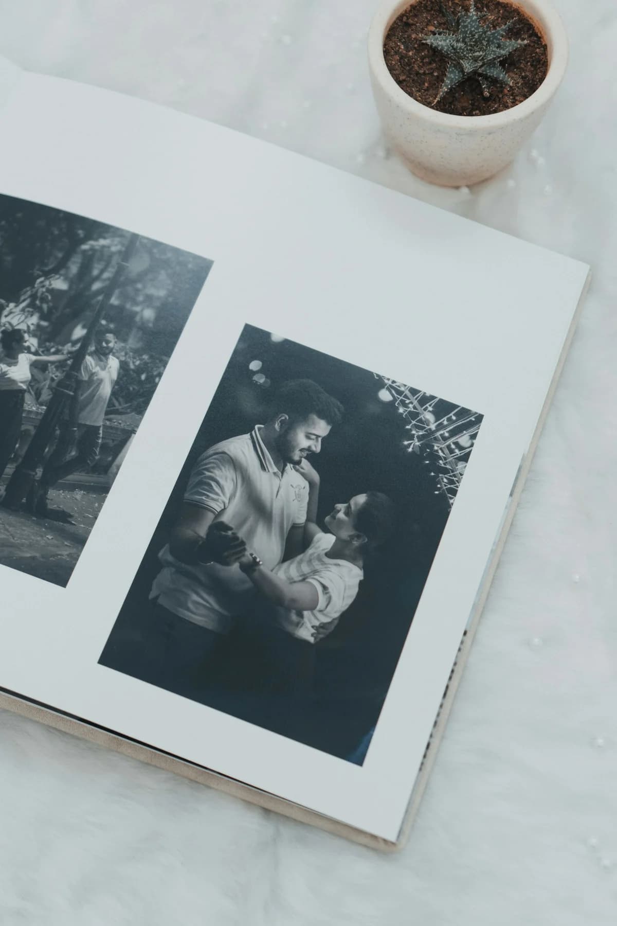 An open album with a baby photo to bring to life with Picture to Video AI